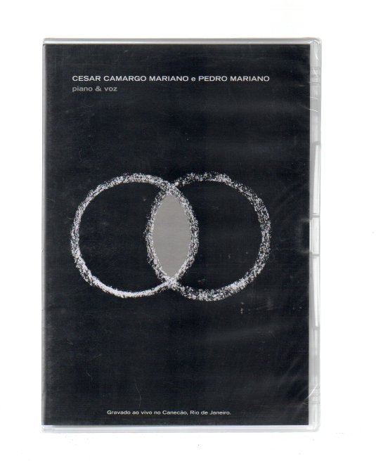 f5782f3df181ebbafaf7b86a4d7fb32b.jpg DVD Cesar Camargo Mariano E Pedro - Piano E Voz - Imagem 1